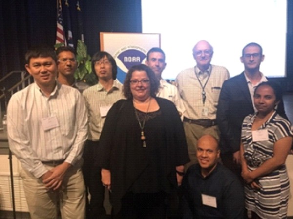 A Nippon Foundation/GEBCO training programme Year 13 family photo at the NOAA Open House with Capt. Andrew Armstrong